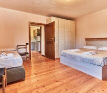 modern bedroom, chalet style apartment accommodation, ski sauze d'oulx